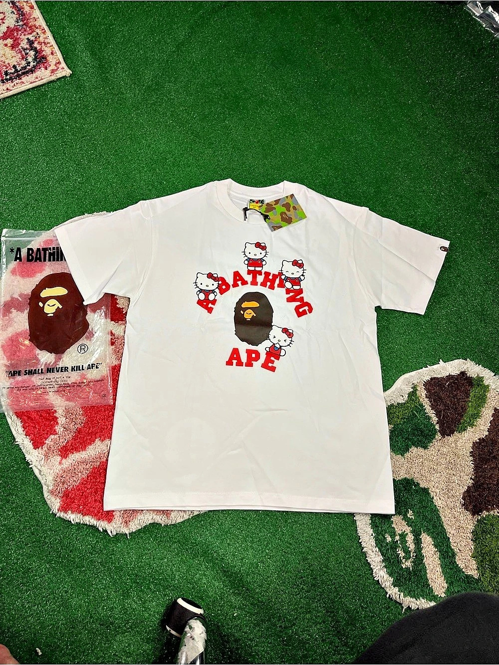A Bathing Ape BAPE x Sanrio Characters Hello Kitty Welcome To The Bape World Tee